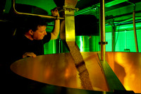 Brewing specialist inspects his recipe- Swansea