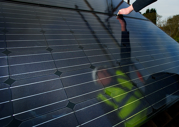 Abstract image of solar panel installation.