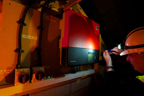 Installer inspects the power convertor