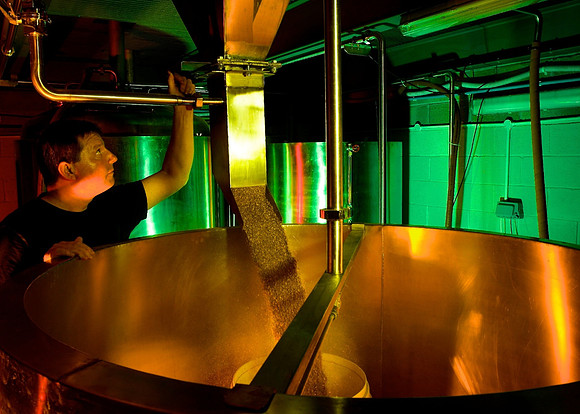 Brewer prepares the hop and water mix.