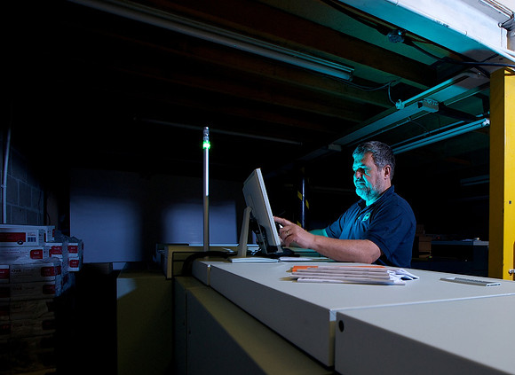 Operator at a printing press.