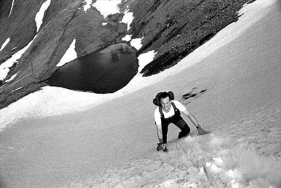Climber descends into a couloir - carefully.